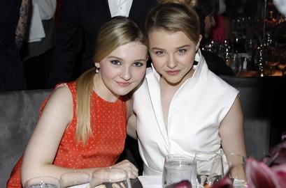 Actresses abigail breslin left and chloe grace moretz pose